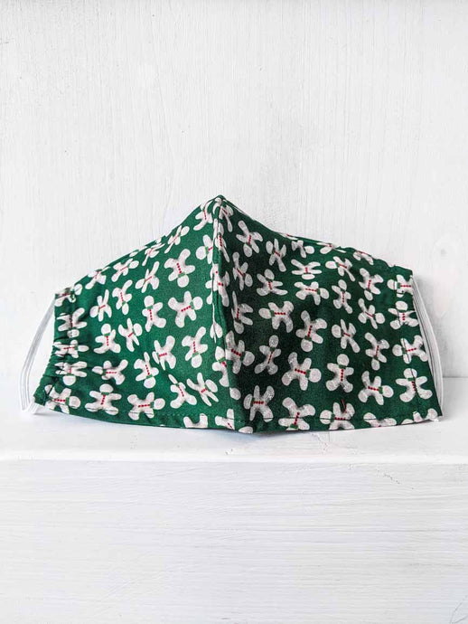 Gesichtsmaske online kaufen für Frauen in Grün mit Weihnachtsmotiv Lebkuchenmuster