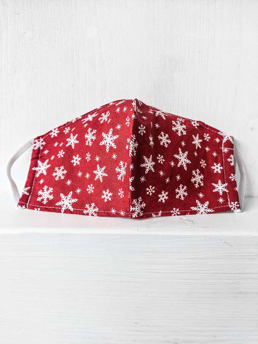 Gesichtsmaske Weihnachtsmotive mit Schneeflocke in rot Onlineshop für Masken kaufen